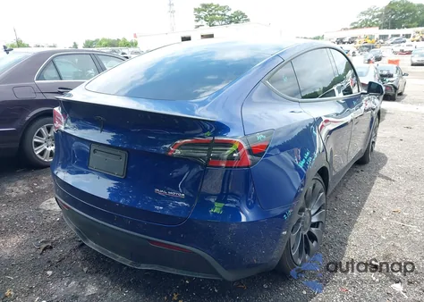 2023 Tesla Model Y Performance Dual Motor All-Wheel Drive z USA, uszkodzony, nr VIN 7SAYGDEF5PF700890